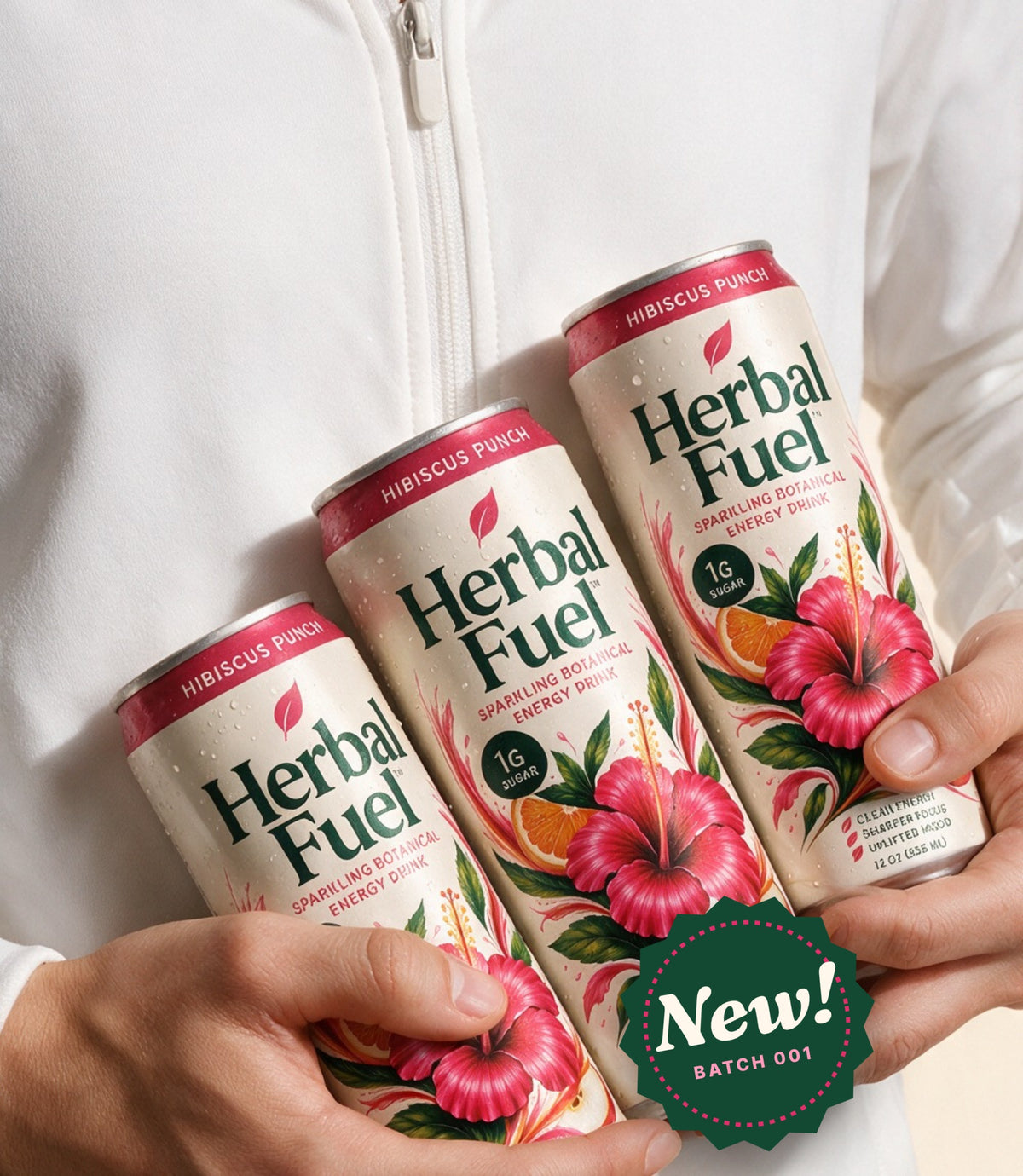 Hands holding cans of Herbal Fuel Hibiscus Punch sparkling botanical energy drink