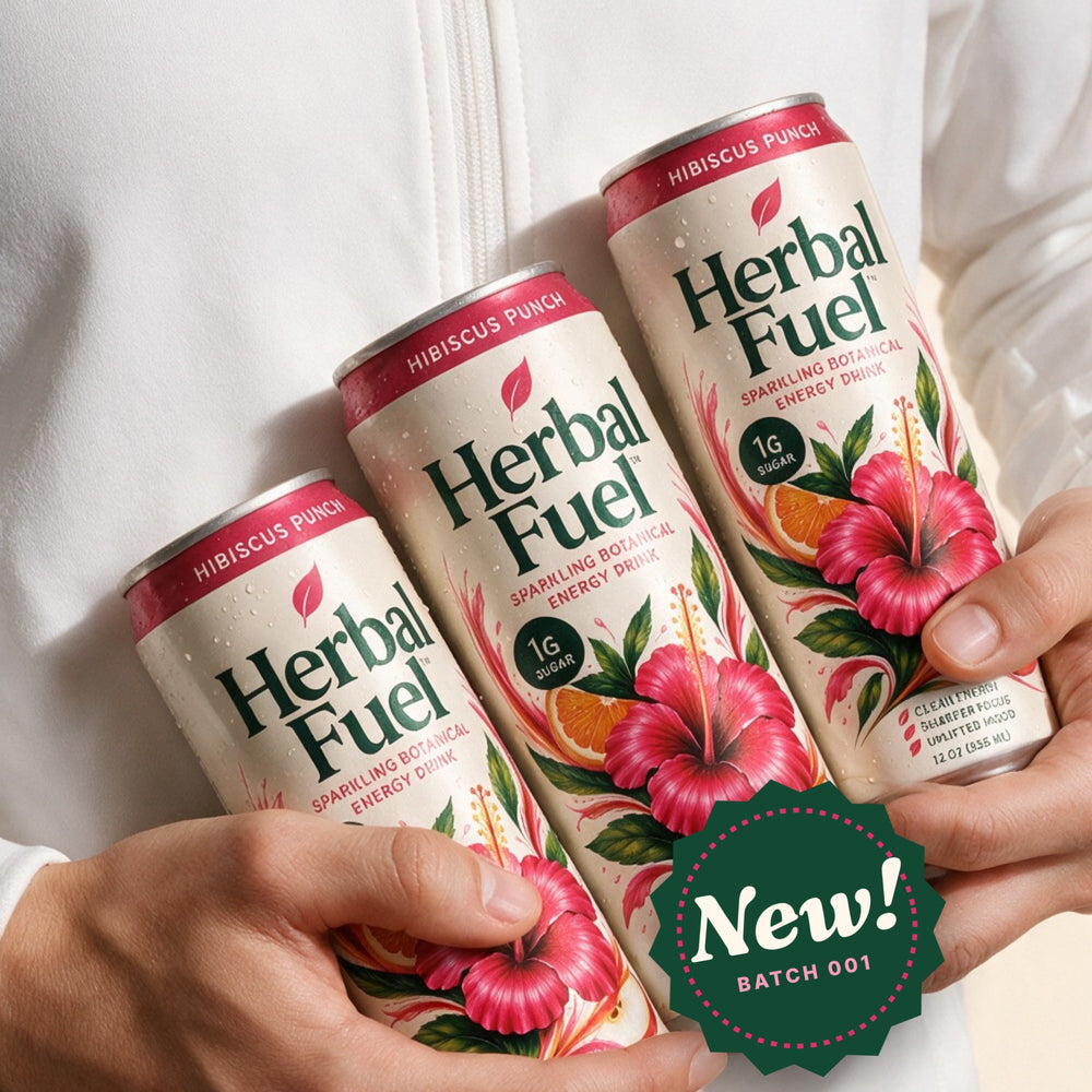 Hands holding cans of Herbal Fuel Hibiscus Punch sparkling botanical energy drink